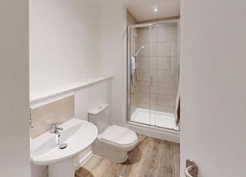 A Modern And Clean Bathroom Featuring A Spacious S...