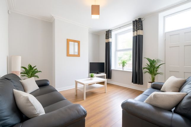 Bright And Spacious Living Room With Large Windows...