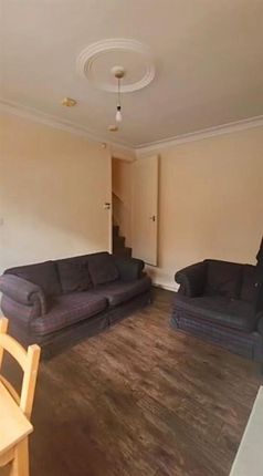 Cozy Living Room Featuring Comfortable Seating Wit...