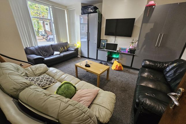 A Welcoming Living Room Featuring Comfortable Sofa...
