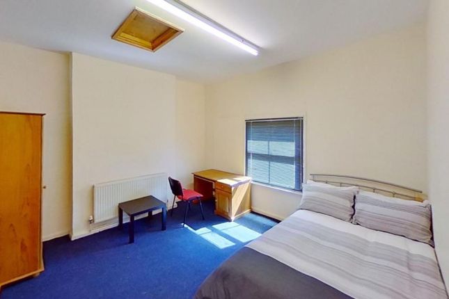 This Inviting Double Bedroom Features Ample Natura...