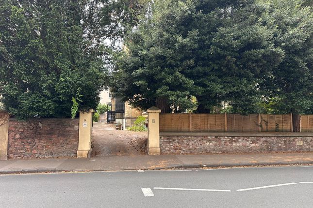 Street-Front Entrance With Stone Boundary Wall, Ga...