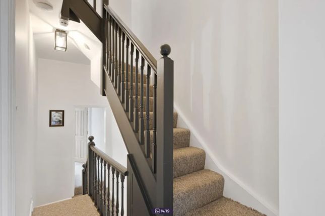A Well-Maintained Staircase With Stylish Railings,...