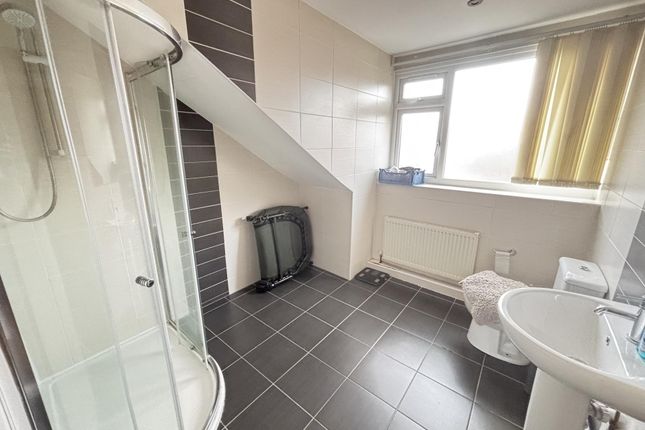 Bright And Spacious Bathroom With A Large Window P...