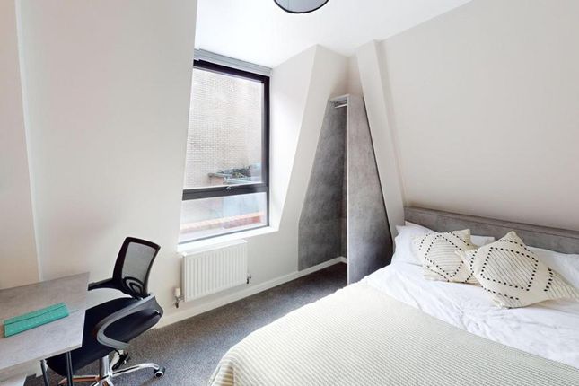 A Bright And Modern Double Bedroom Featuring A Coz...