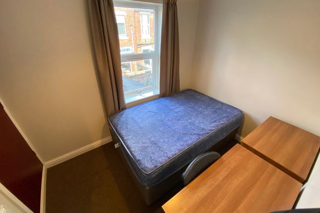 This Inviting Double Bedroom Features Ample Natura...