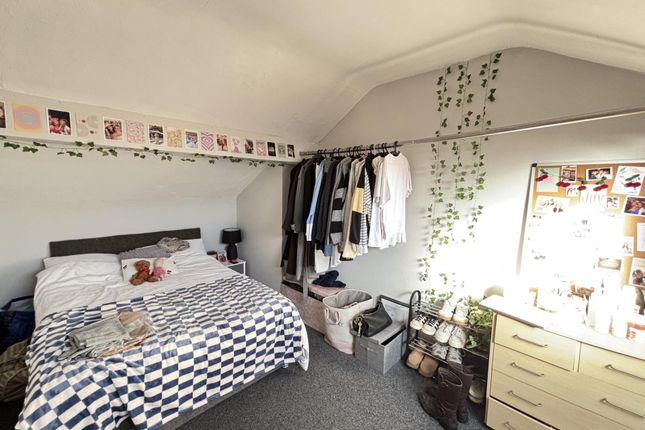 Cozy Bedroom Featuring A Double Bed And Ample Natu...