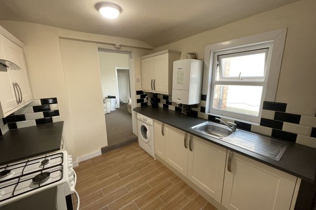 Bright And Functional Kitchen With Ample Natural l...