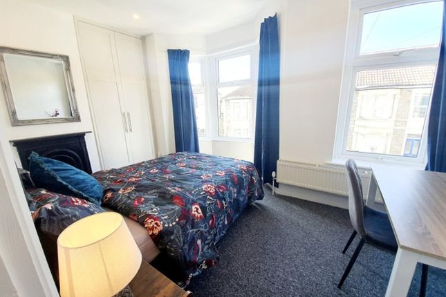 Bright And Inviting Double Bedroom Featuring A Com...