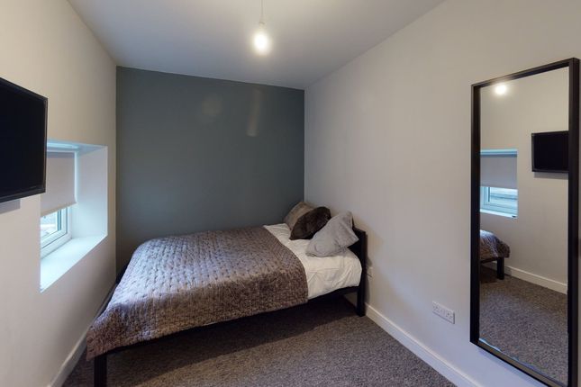 A Stylish And Inviting Double Bedroom Featuring Mo...