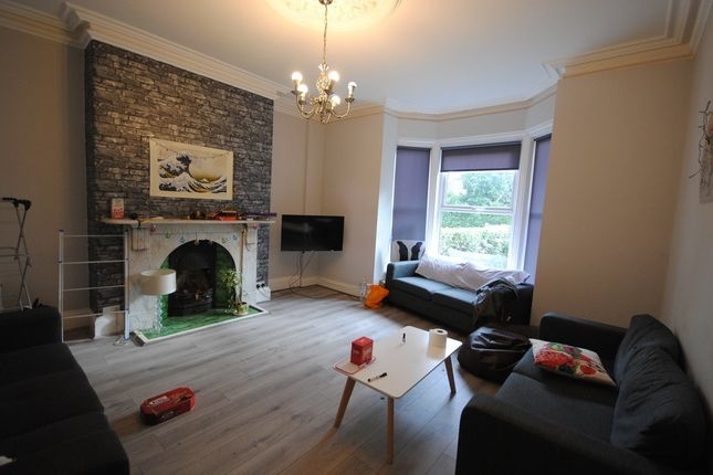 A Spacious, Well-Maintained Living Room Featuring ...