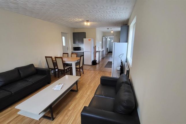 Bright, Modern Living Room With Comfortable Black ...