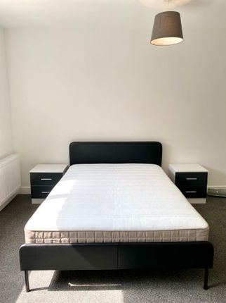 A Bright And Spacious Double Bedroom Featuring Mod...