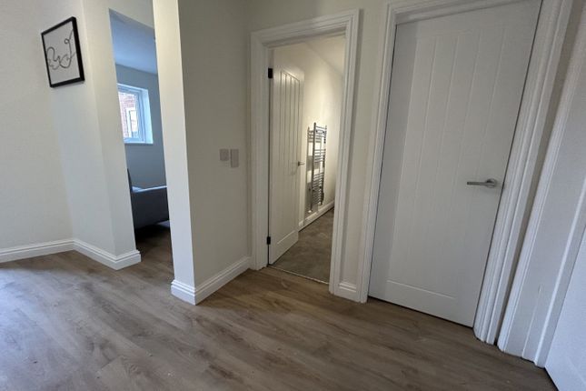 A Bright And Tidy Hallway That Welcomes You Into T...