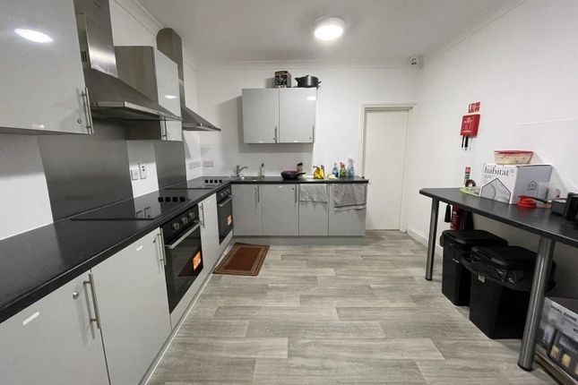Modern Fitted Kitchen With Sleek Grey Cabinets, In...