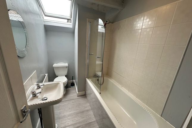 A Bright And Spacious Bathroom Suite Featuring A c...