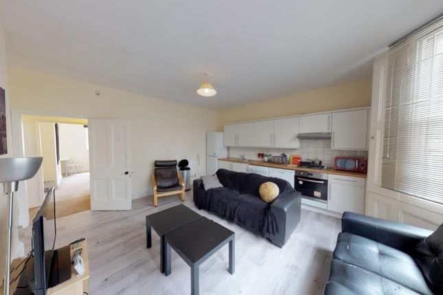 A Bright And Modern Living Room Featuring Stylish ...
