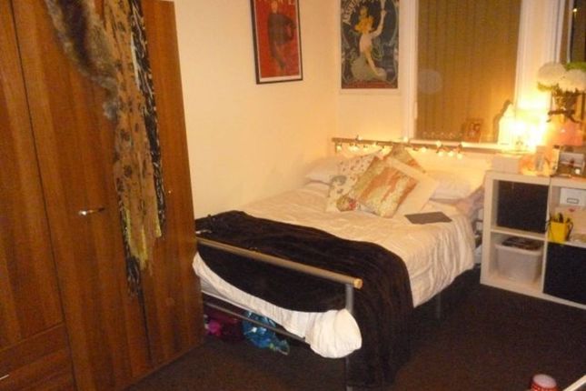 A Well-Presented Master Bedroom Featuring A Large ...