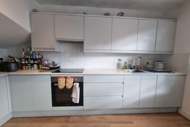 Modern, Clean Kitchen With Ample Storage And Works...