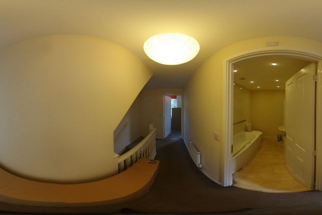 A Bright And Tidy Hallway Leading To Various Rooms...