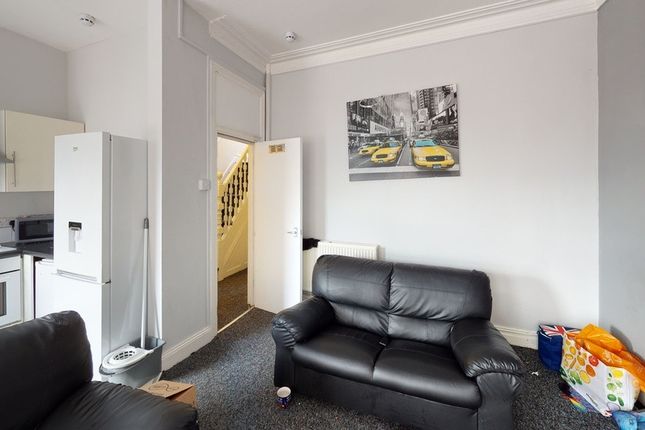 Bright And Modern Living Room Featuring Comfortabl...