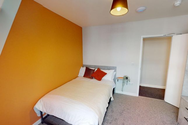 A Bright And Inviting Double Bedroom With Modern d...