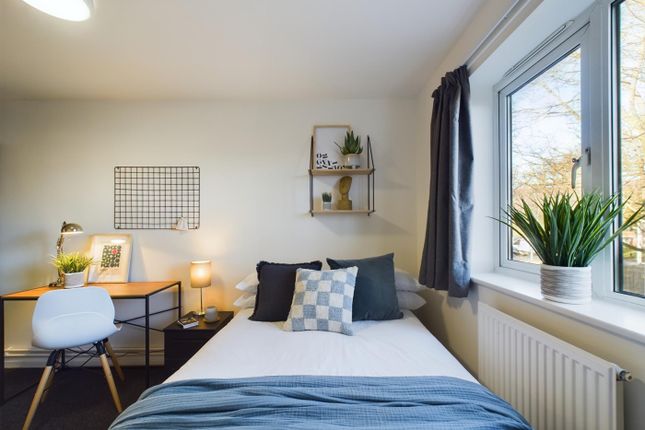 A Bright And Inviting Double Bedroom With Stylish ...