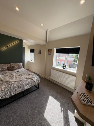 Bright And Modern Double Bedroom Featuring A Patte...