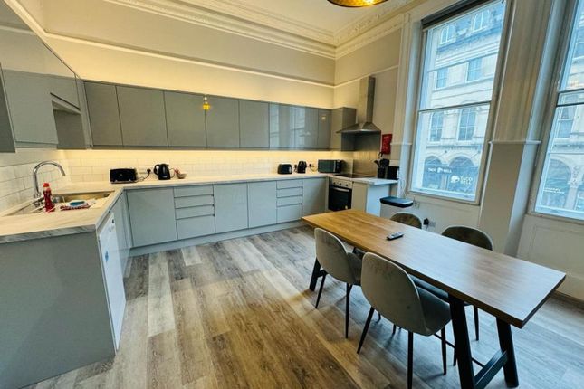 A Spacious And Modern Kitchen With Ample Natural l...