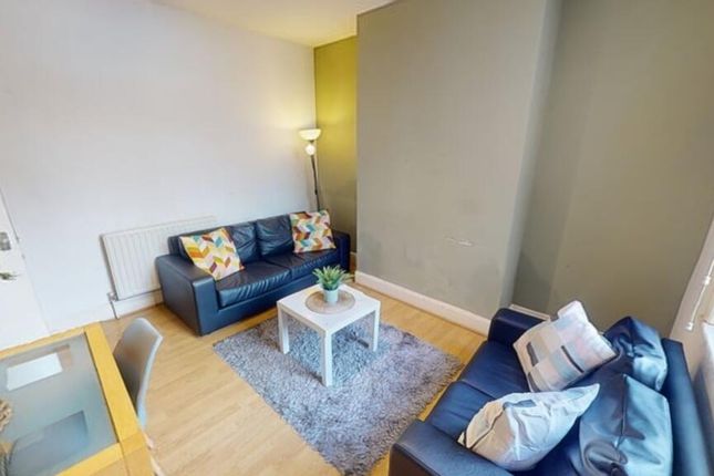 Bright And Inviting Living Room With Modern Furnis...