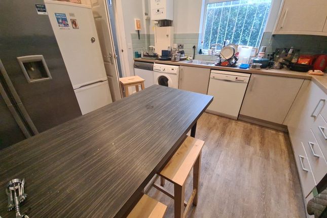 A Modern Kitchen Featuring Ample Counter Space, A ...