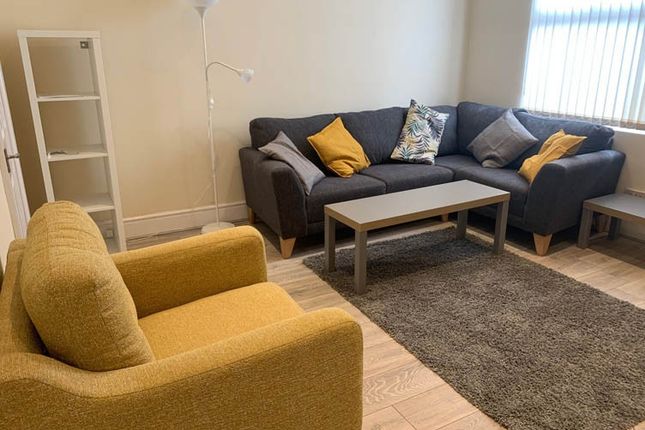 Bright, Neatly Furnished Lounge With A Comfortable...