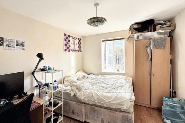 This Cozy Double Bedroom Features Ample Natural li...