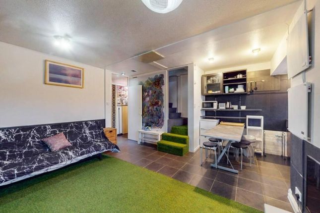 A Stylish And Inviting Living Room With Modern Dec...