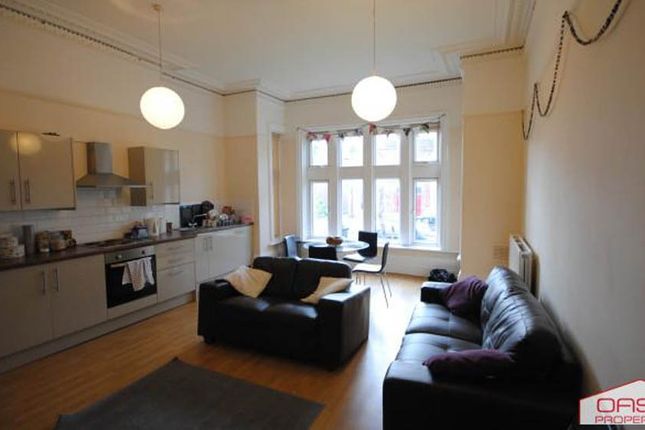 Bright Open-Plan Living Area With A Fitted Kitchen...
