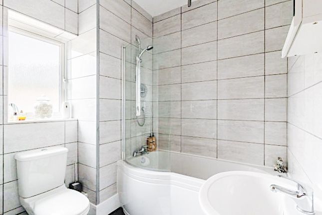 Bright, Modern Bathroom With A Curved Shower-Bath,...