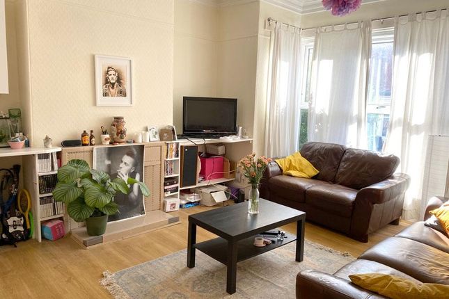 Bright, Welcoming Living Room With Large Bay Windo...
