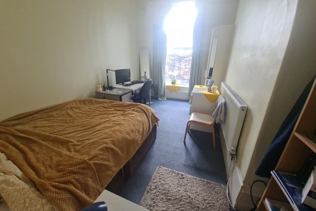 Cozy Single Bedroom With A Comfortable Bed, A Desk...