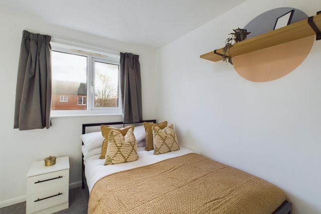 A Bright And Inviting Double Bedroom Featuring Coz...