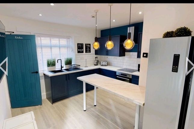 Bright Modern Kitchen With Navy Blue Cabinetry, Wh...
