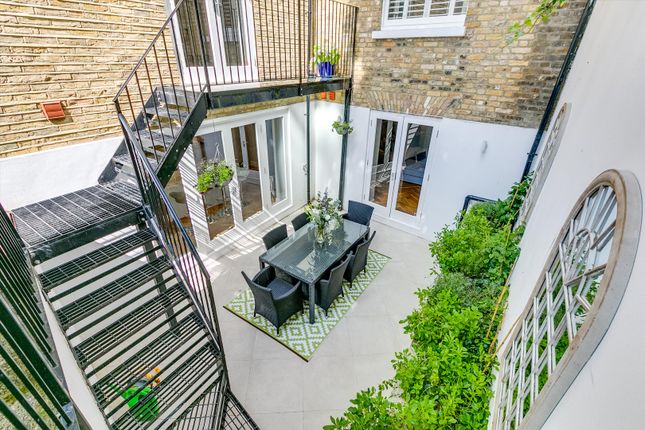 End terrace house for sale in Crescent Grove, London SW4.