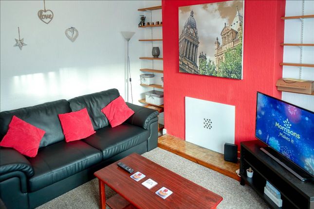 This Inviting Living Room Features A Comfortable B...