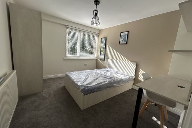 A Bright And Spacious Double Bedroom With Modern d...