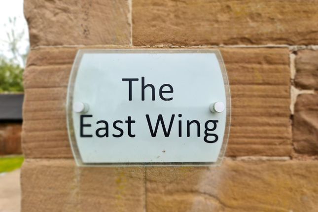 East Wing Sign.Jpg