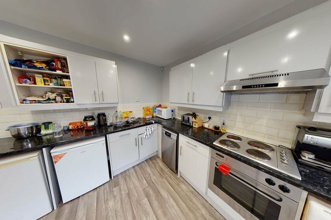 A Modern, Well-Maintained Kitchen Featuring Ample ...