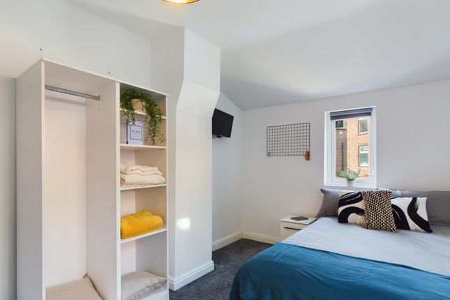 A Bright And Inviting Double Bedroom Featuring Mod...