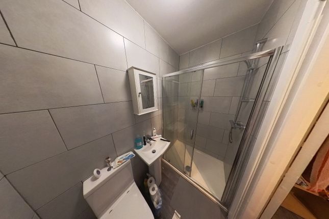 A Modern, Well-Maintained Bathroom Featuring A Lar...