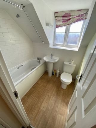 This Beautifully Designed Bathroom Features Modern...
