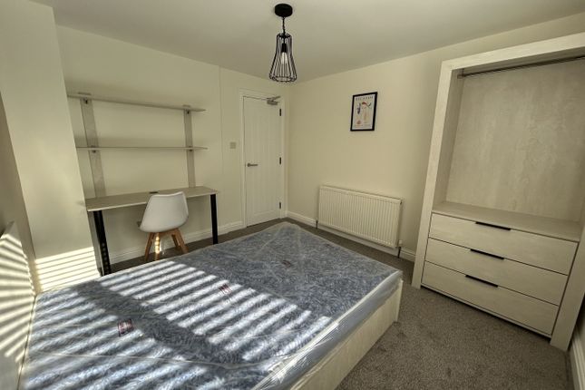 A Bright And Spacious Double Bedroom Featuring Mod...