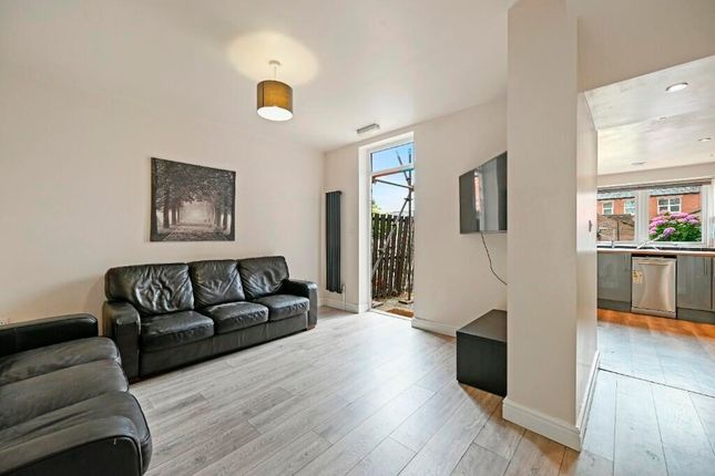 Bright And Modern Living Room Featuring Comfortabl...